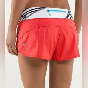 Limited Edition LULULEMON "Run: Speed Short" short in Red, B/W waistband, 8